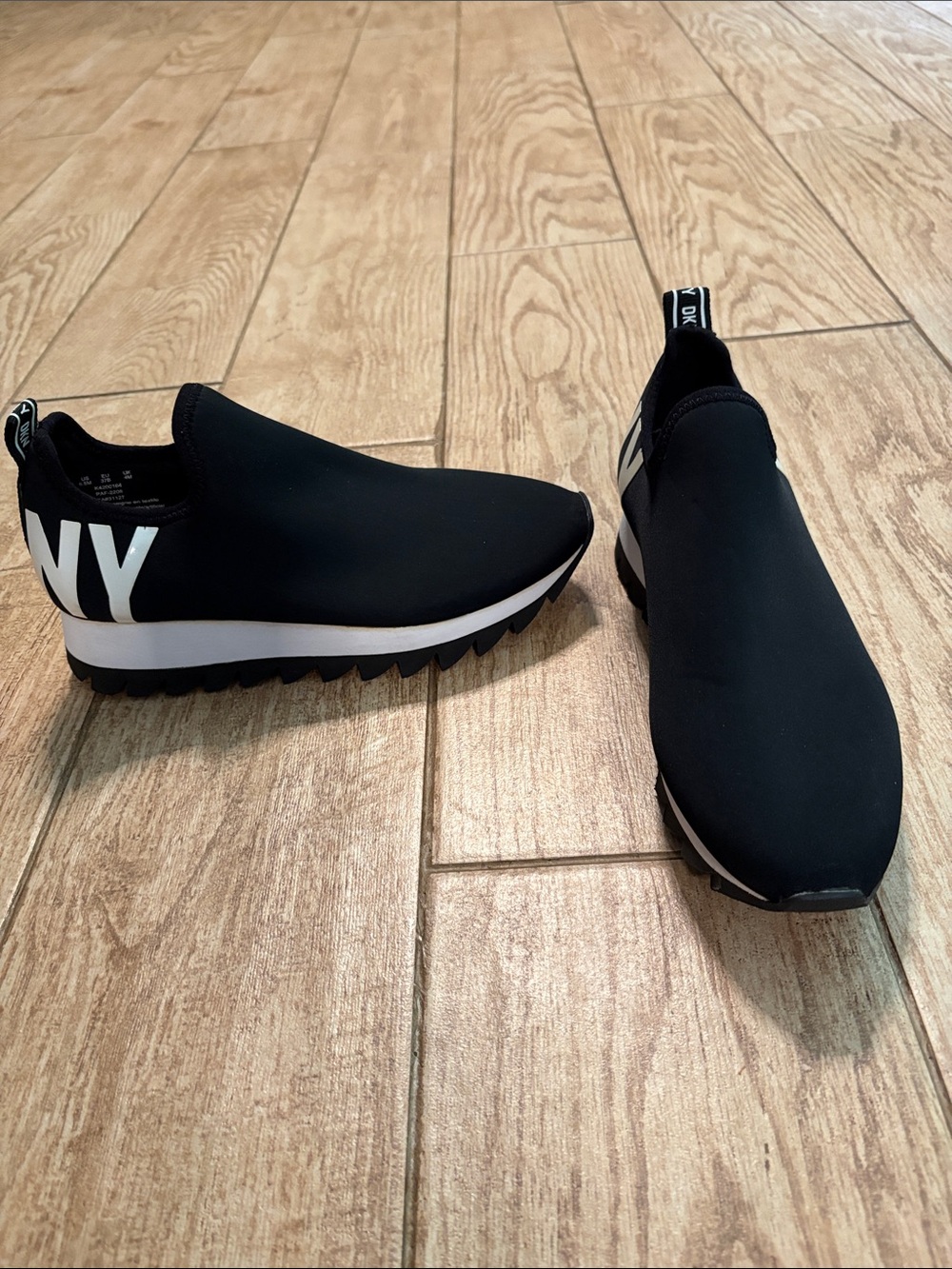 DKNY Men’s Black Slip-On Sock Sneakers with White Logo